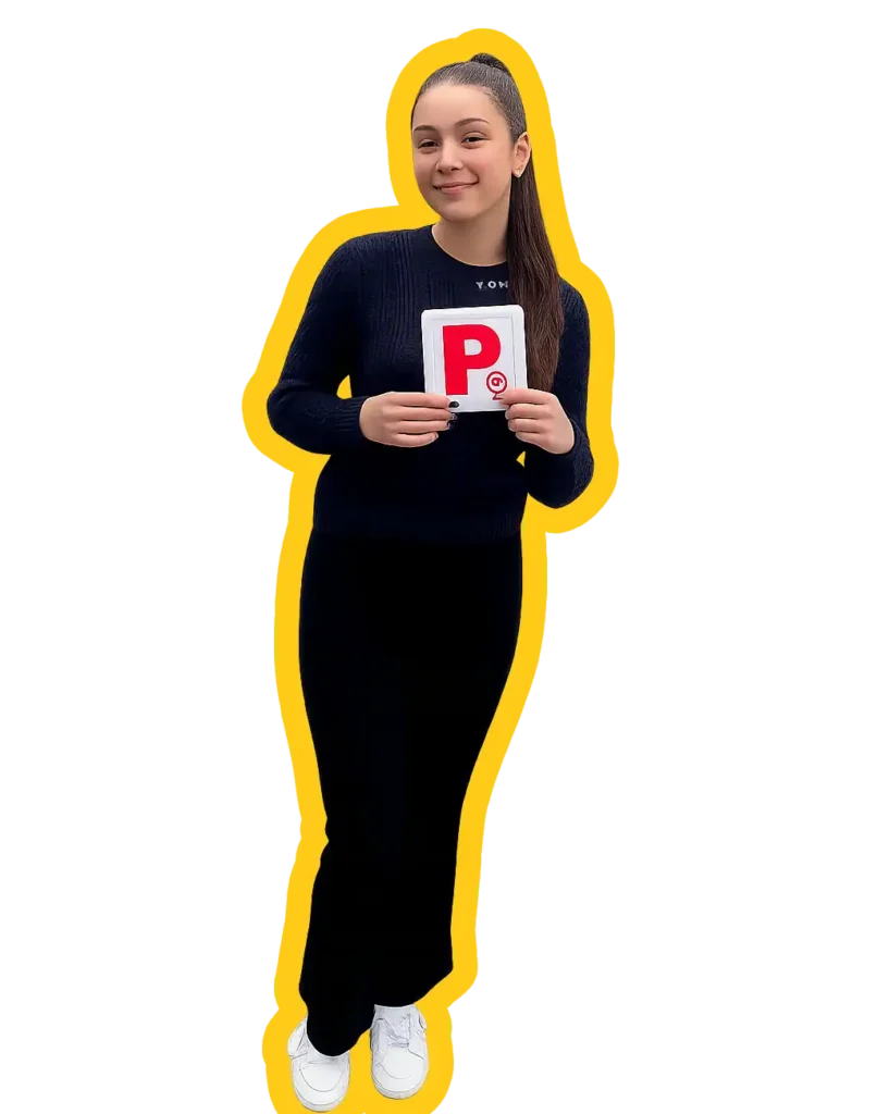 A girl is holding P plate